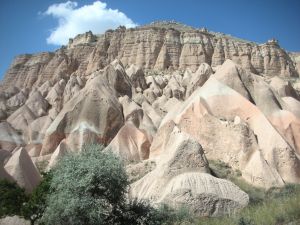 Rose colored canyon scooped rocks in the Rose Valley of Cappadochia
