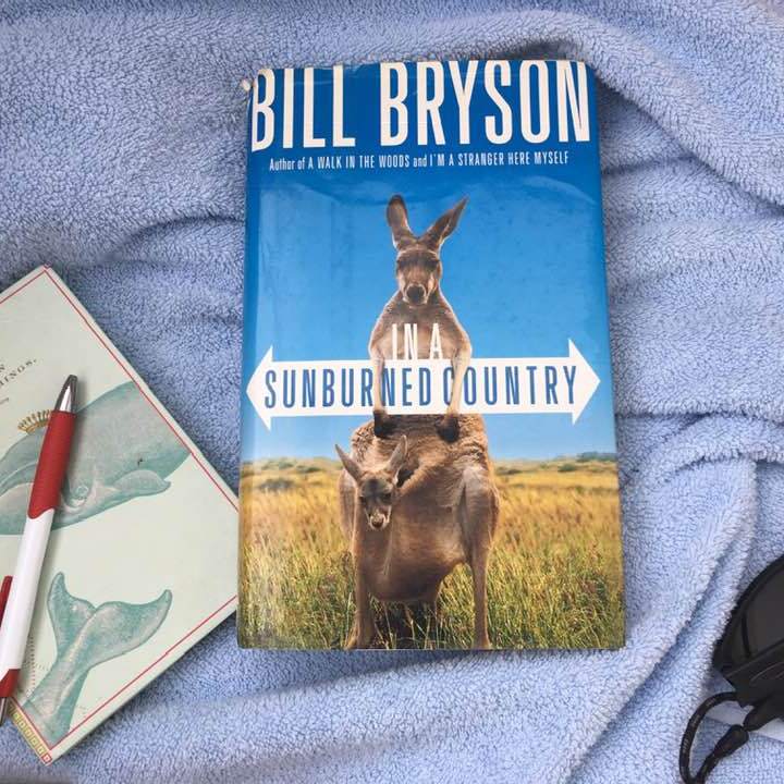 Travel book with travel journal, pen and sunglasses