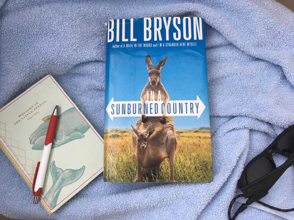 Travel book with travel journal, pen and sunglasses