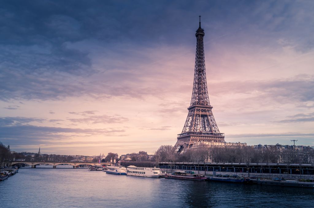 A view of the Eiffel Tower along the Seine River in Paris